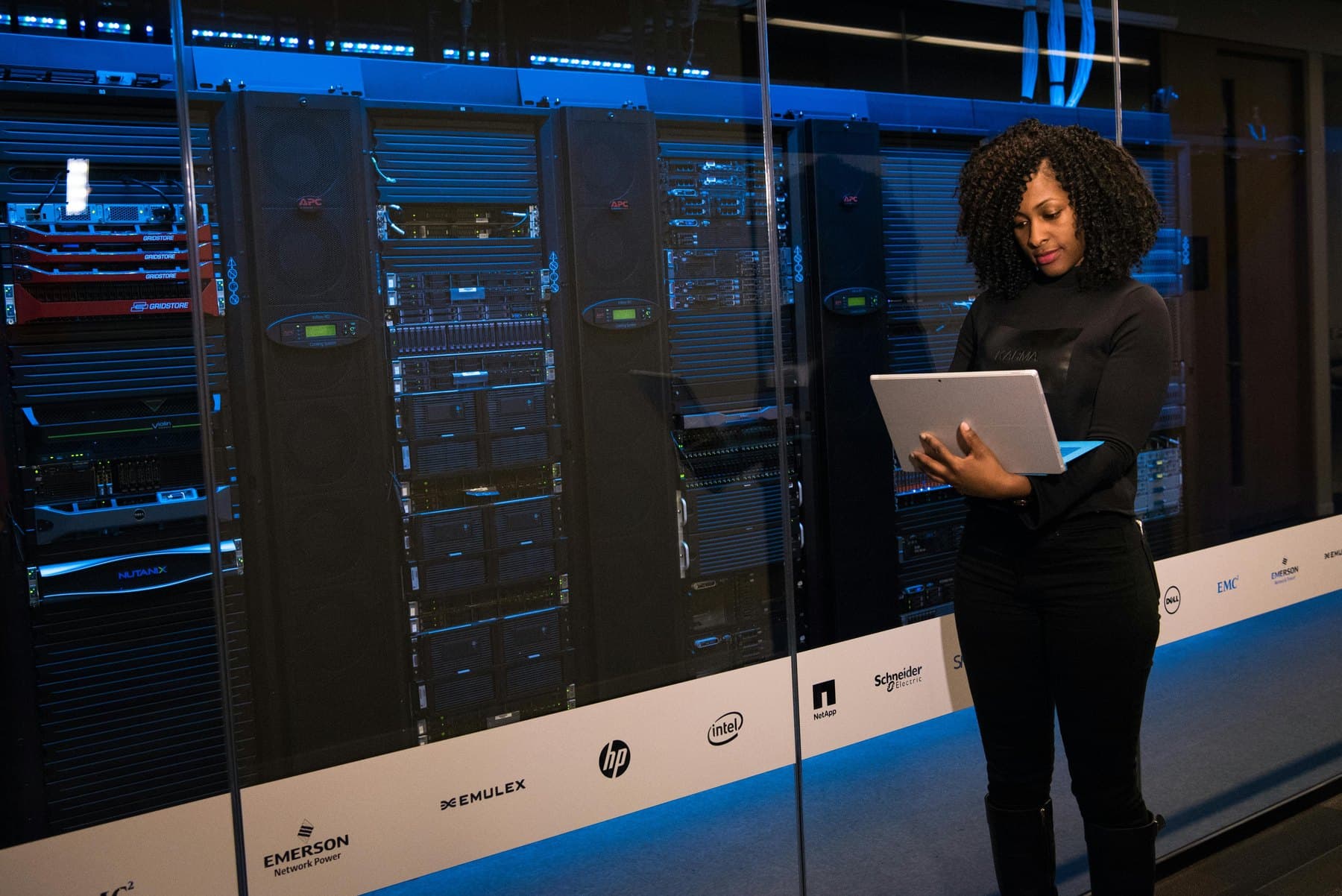 Engineer working near server equipment for database systems