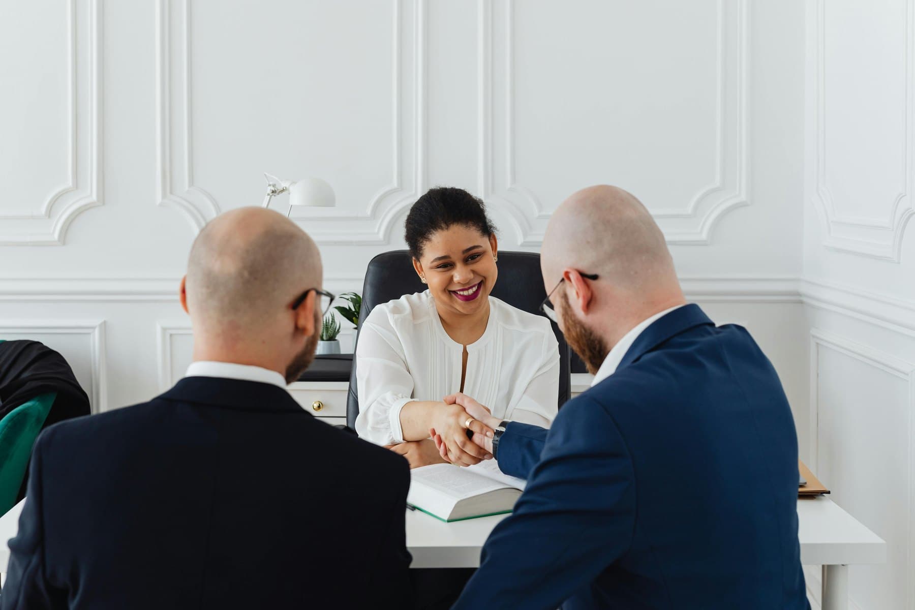 Professional consultation meeting with a client handshake
