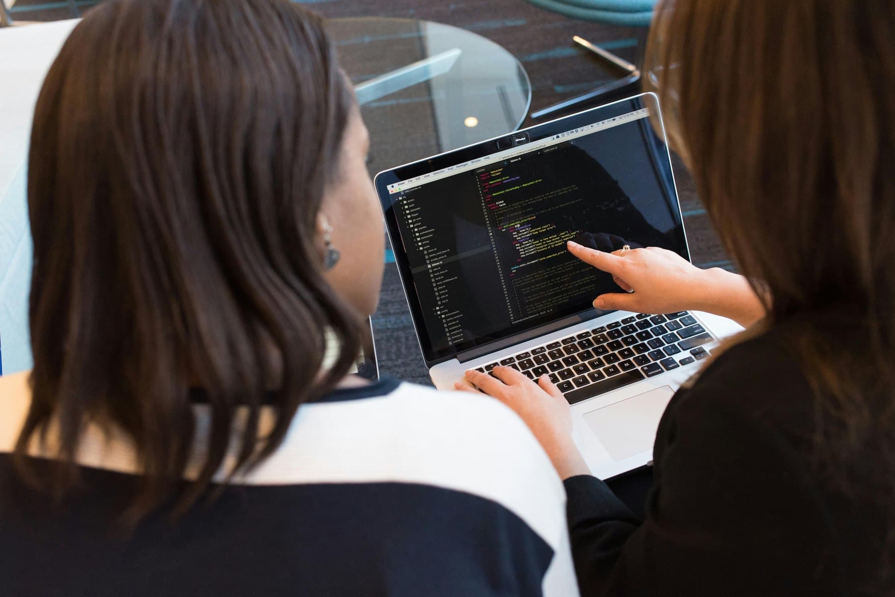 Software team reviewing code and application design together