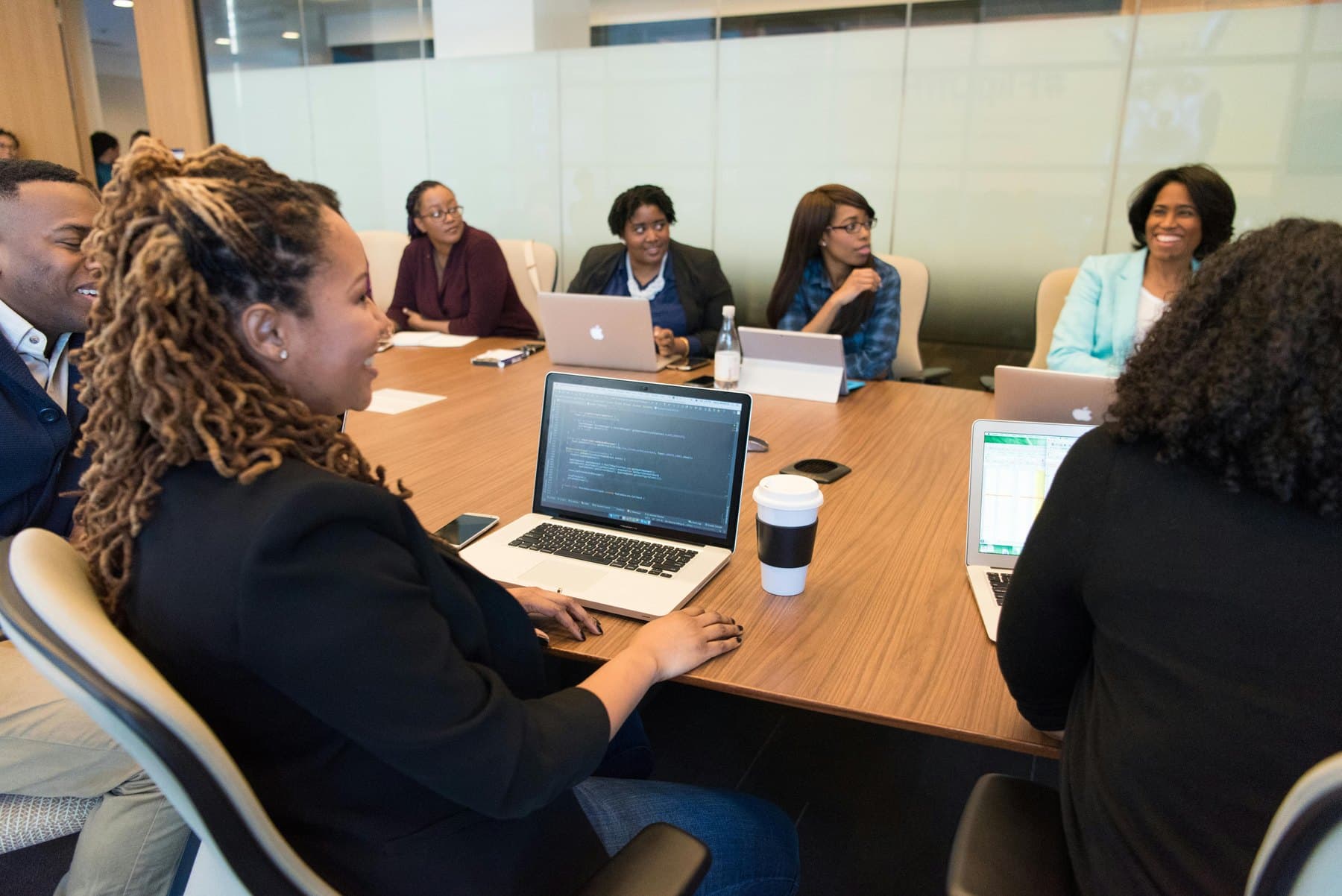 Technology team meeting to coordinate workforce and project resources